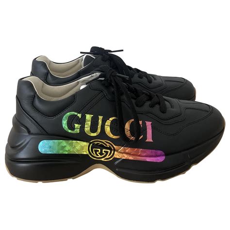 gucci men's rhyton gucci logo leather sneakers|Gucci rhyton black and white.